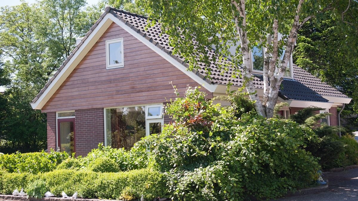 Vakantiewoning Weidezicht vooraanzicht met tuin